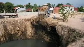Project! Dump Truck dumped soil to Delete pond Flooded with bulldozer Pushing