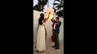 LanternsandMore - Lighting a Wishing Sky Lantern - Beach Wedding