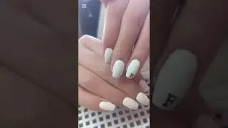 🤍 White serenity with a initial.