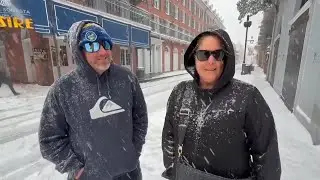 An Australian couple is surprised to witness snowfall in New Orleans as they visit the city