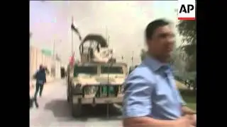 Iraq officials say at least 12 dead as 3 loud explosions rock Baghdad