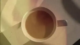 Covid-eo #5 Isolated Clouds of Stale Dried Milk in My Coffee