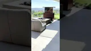 Watching TV outside with Cabinet Tronix hidden TV lift cabinet