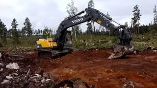 Excavator Volvo ec220 , Digging Forest Road in Sweeden