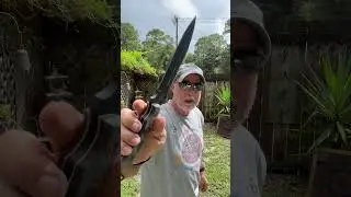 TOPS Knives Smoke Jumper Fixed Blade Knife Thrown in the Board