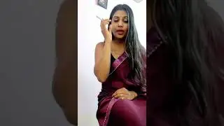 Indian girl in saree smoking two cigarettes back to back.