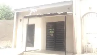 Goat trapped on a roof peeing