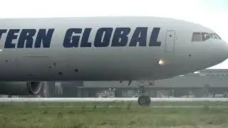 never a boring moment , wind , rain , birds ! Arrival  Douglas ND11F , N804SN , Ostend Airport