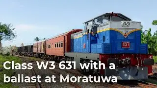 Repainted Class W3 631 at Moratuwa with a ballast train