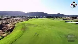 H18: 570-yard dogleg left par 5, lava/bunkers, challenging green