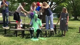 Warner Elementary School principal Ben Gilpin gets slimed
