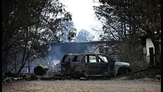 Gospers Mountain blaze under control as conditions ease for firefighters