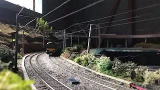 Lima class 87 87005 City of London pushing a Virgin trains EBW set & Silverlink County 321435