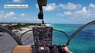 A low helicopter flight over an exotic beach