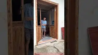 Simple Wood Threshold Installation at Rural House Door