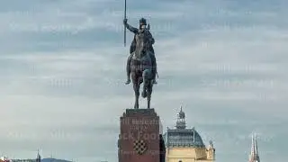 Monument of the Croatian King Tomislav timelapse hyperlapse and art pavilion in colorful park, in