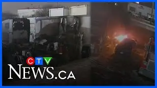 Police searching for suspects that set tow trucks on fire at auto repair shop in Brampton, Ont.