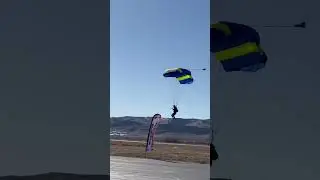 Watching  parachuters landing!