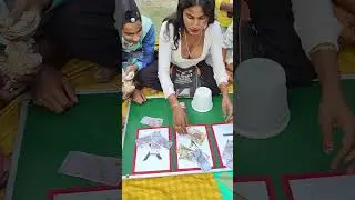The girl is stealing money by playing with alphabets.