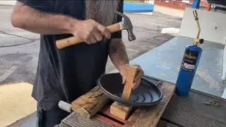 Taking a torch and hammer to a Wagner cast iron lid to... 
