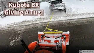 Kubota BX- Rescuing the neighbors!! (Pulling Out Stuck Vehicles + Plowing 3 Feet Of Snow!)