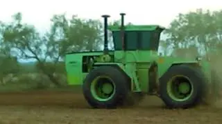 Steiger ST 270 Cougar III plowing