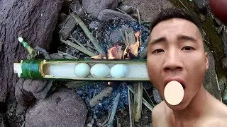 Primitive Technology  Ben - Delicious food - Smart cooking boy cooking Eggs in bamboo tubes