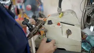 woman locksmith is making a key duplicate in the s 2023 11 27 05 34 36 utc 222