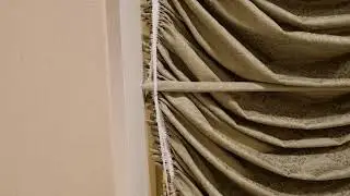 pc rods back of Austrian drape.