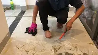 Help technicians remove glue stains on marble floors