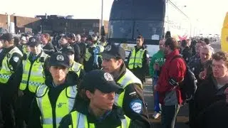 Montreal Police Walk Bus Past Aveos Blockade