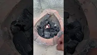 Combining three techniques for lighting a charcoal stove.