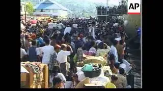 INDONESIA: AMBON: REFUGEES TRY TO FLEE VIOLENCE