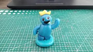 Die polymer clay blue rainbow friends.