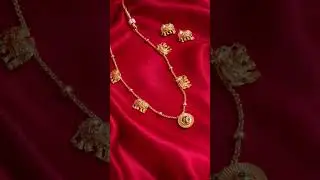 Elegant Elephant motif crafted neck chain with a round pendant ... #jewellery  #templejewellery