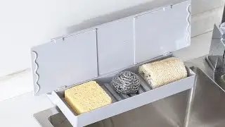 Retractable sink baffle with storage