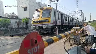 Mumbai Local Train at Sewri Level crossing