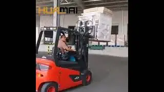 Carton Clamps in Action Fast Paced Appliance Handling at a Logistics Hub