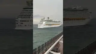 The weather is bad and the waves are rough for this cruise ship. It eventually leaves the area.
