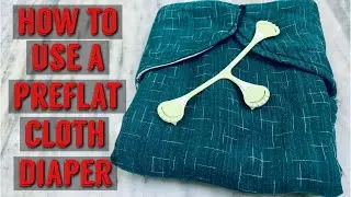 How to fold a preflat diaper and put it on baby | how to use a preflat cloth diaper