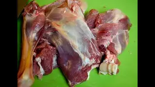 Cooking In Oven. A Leg of Lamb In a Glass Jar