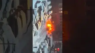 Car on fire in a NYC parking lot 