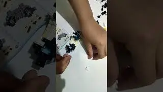 Merakit bricks pinguin donat