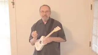 DoSo E:  Strumming a Mini Loog Guitar