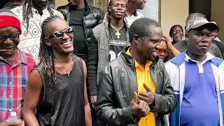 Bosmic Otim Attacks Those Defending Maria A