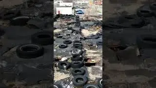 An abandoned building in Gary covered in used tires Can someone please explain?
