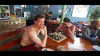 Day 10.2 : Darius playing Chess after breakfast at Camp 1 Noi's Cafe