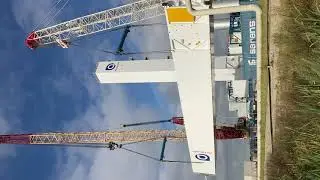 Tandem lifting huge tower with two heavy mobile crawler cranes (part 1)