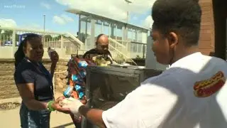 North Minneapolis teen's hot dog stand back in business