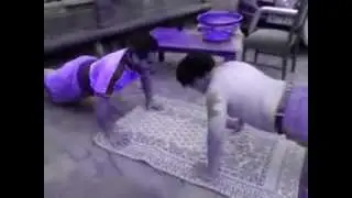 Dad and Johnny's push-up comp.